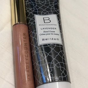 Brand new mini lip gloss/hand cream with gift bag!